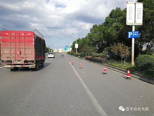 公路养护车高峰作业引拥堵,网友求助上高交警解困扰